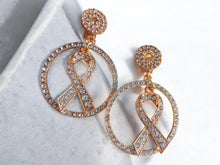 Load image into Gallery viewer, Clip On rhinestone ribbon  Awareness earrings handmade
