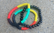 Load image into Gallery viewer, Mens red yellow green black acrykic disc and wood bead  Layering Bracelet set new
